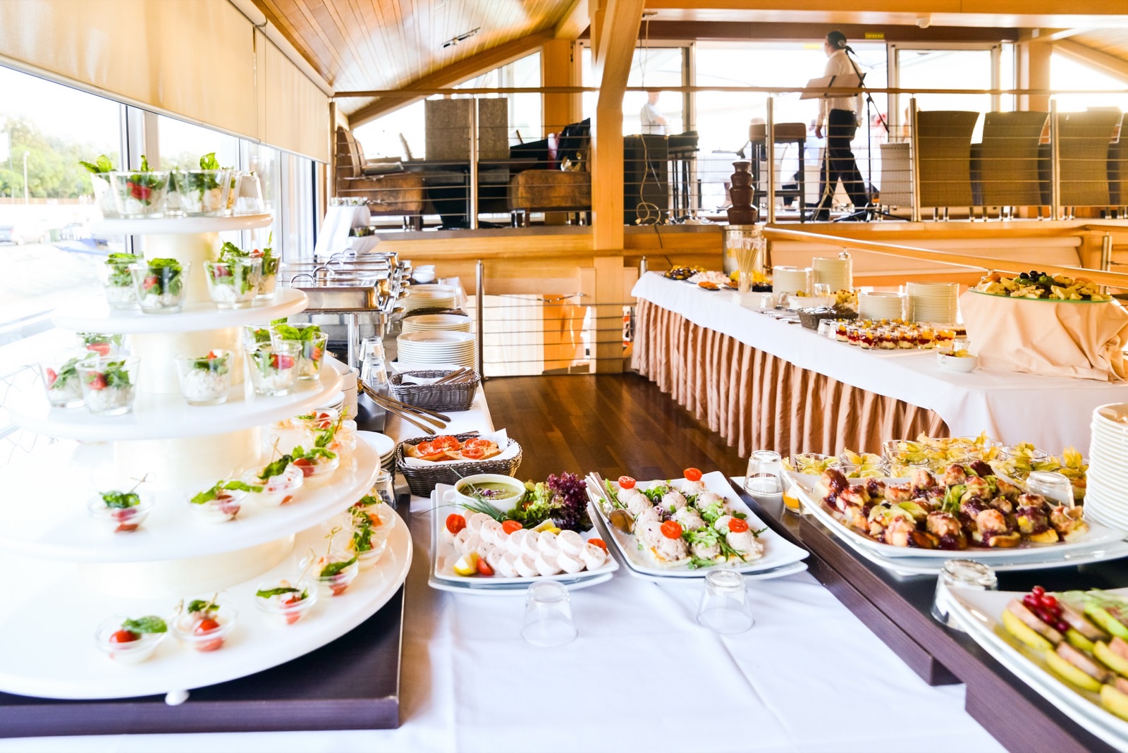 The buffet table on board, cold bites on tiered stands