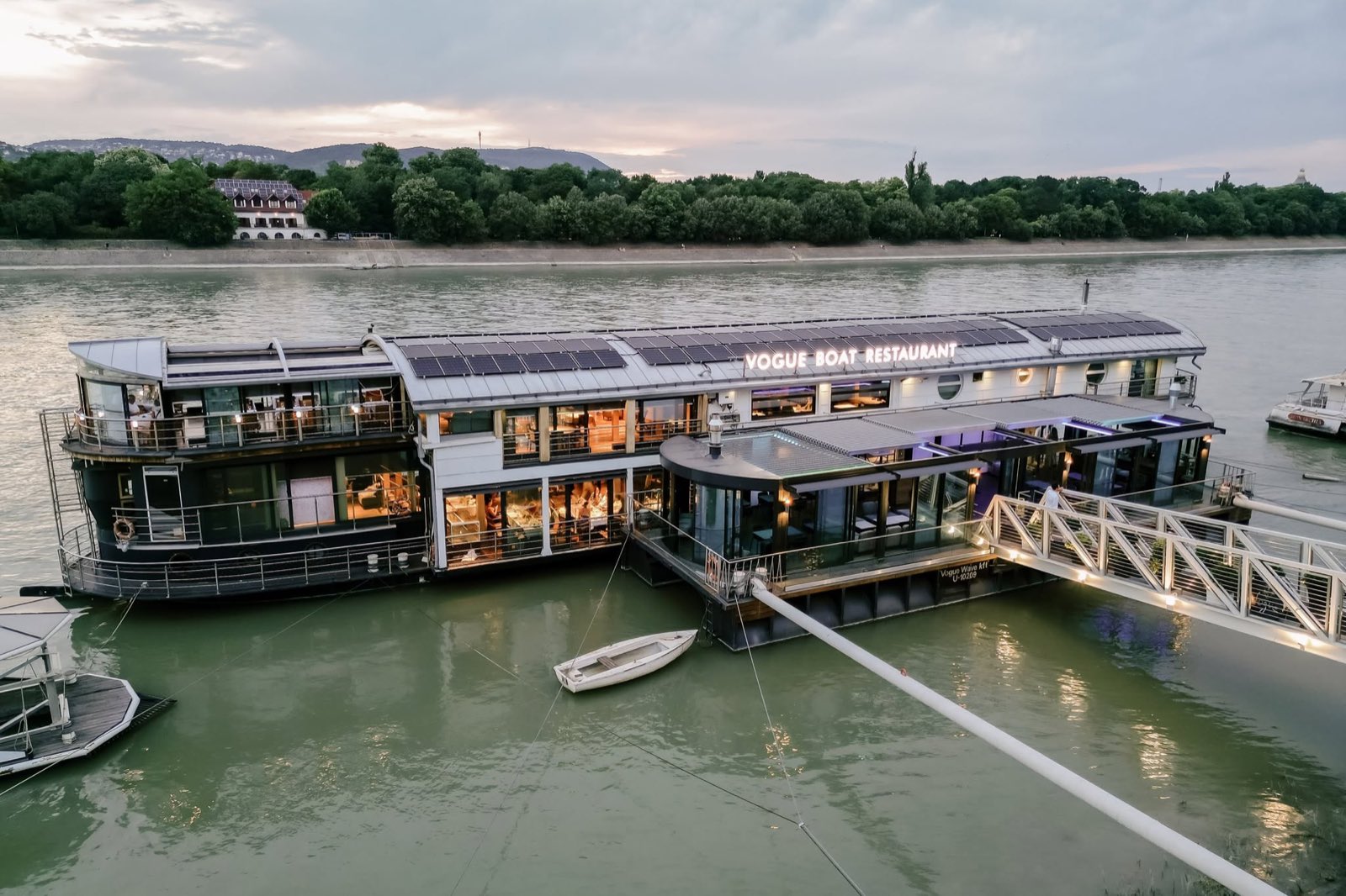 The Vogue Boat Restaurant seen from the Danube at dusk